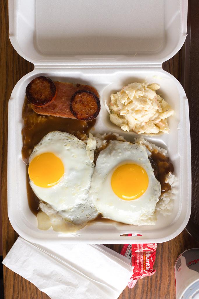 A plate lunch with loco moco (plus spam) and a scoop of mac salad on the side