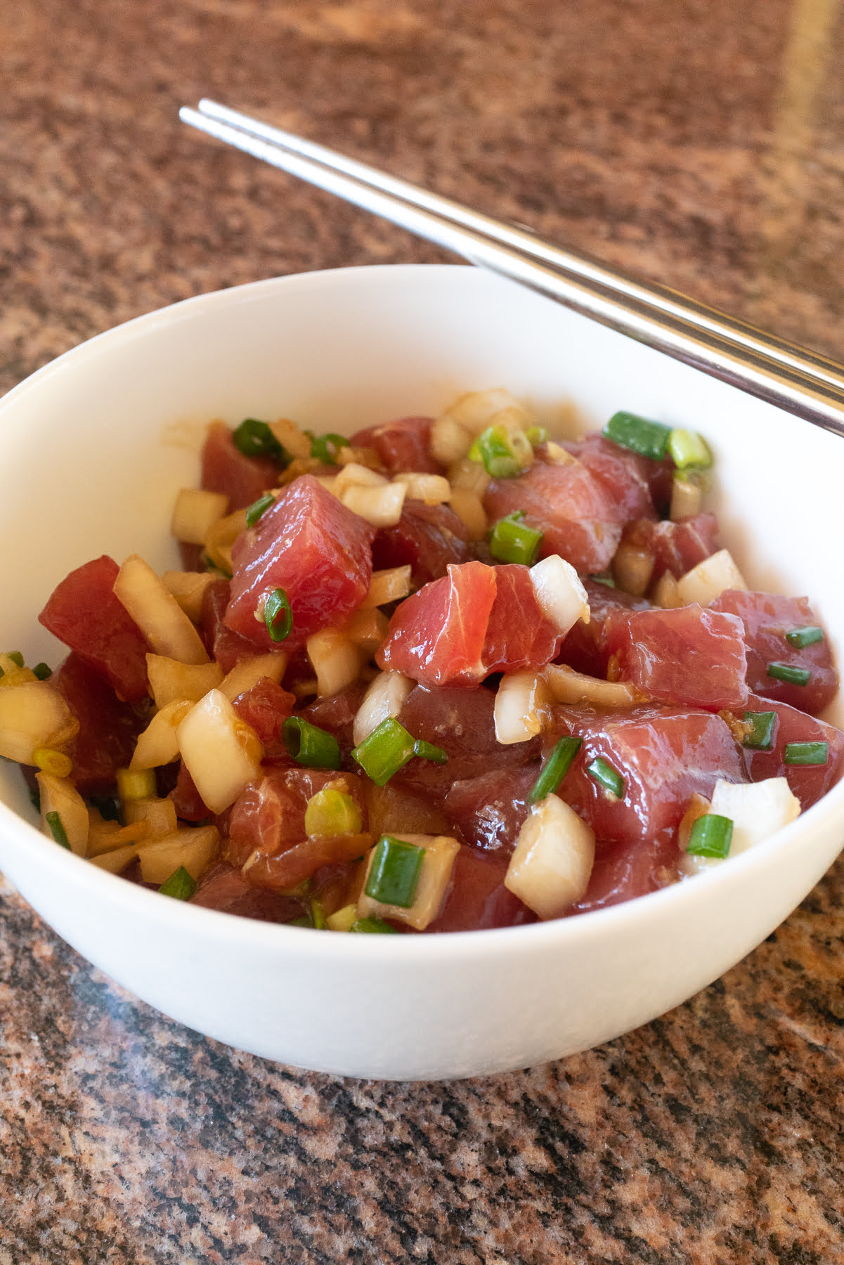 A bowl of prepared ahi poke, ready to eat and enjoy.