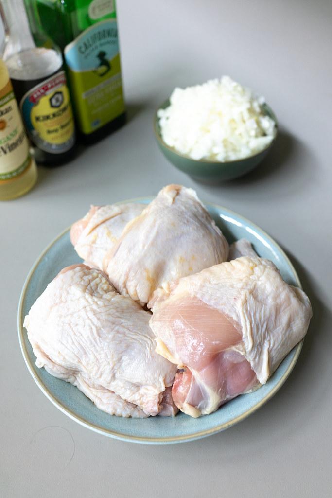 Just 5 ingredients: chicken thighs, onions, soy sauce (shoyu), rice vinegar, and olive oil.