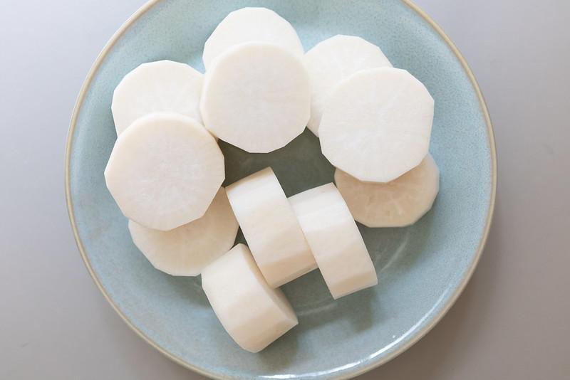 Peeled and cut daikon. Each piece is about 1-inch high.