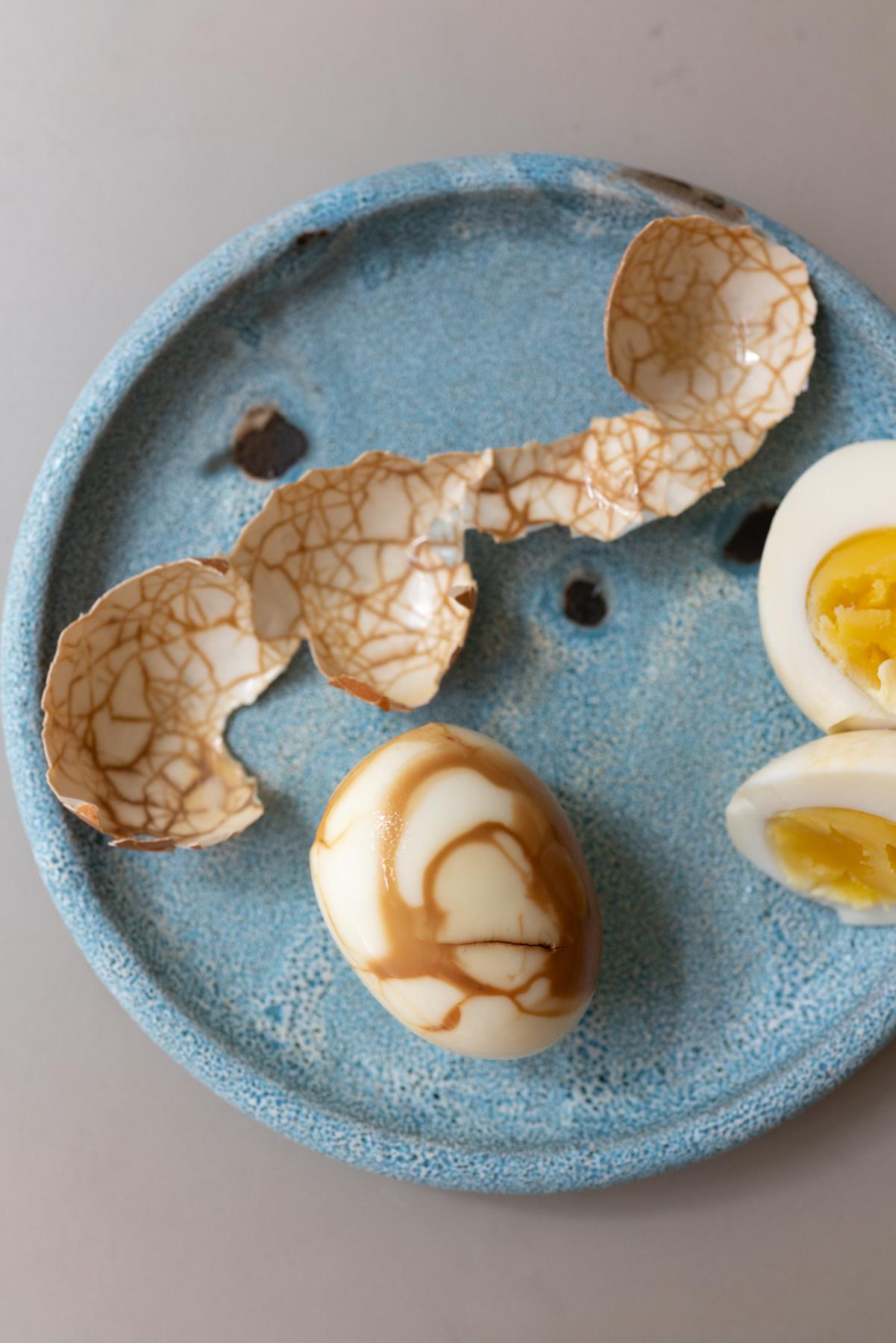 Chinese tea eggs on a plate, ready to eat