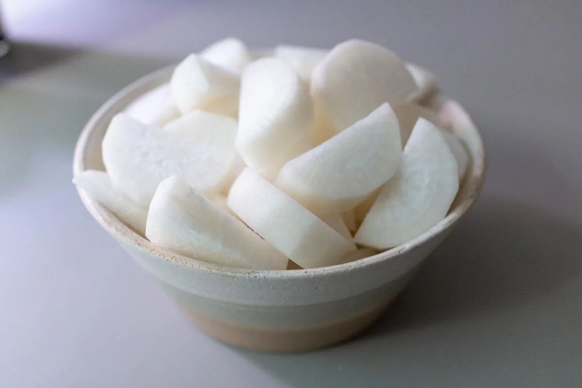 Peeled and cut daikon in a bowl