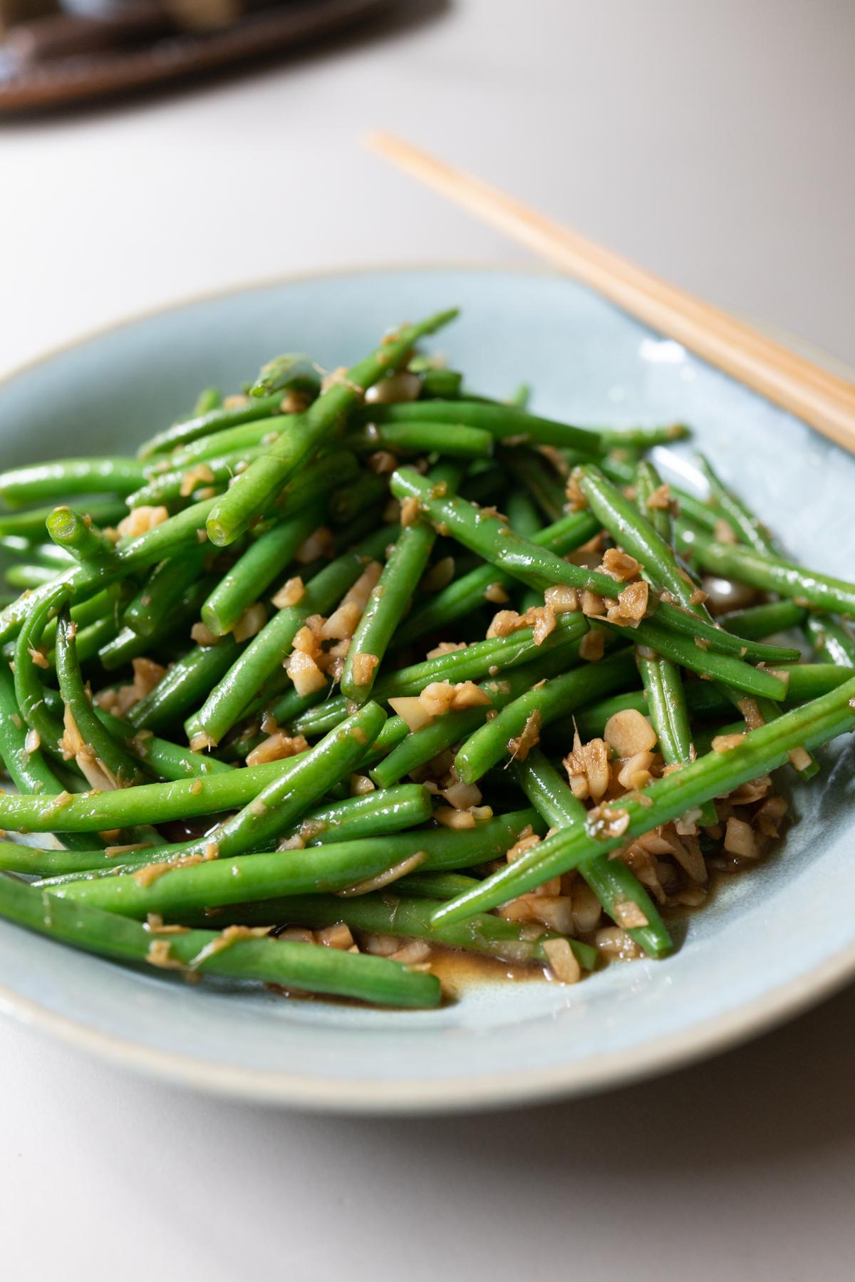 Garlic ginger green beans, plated and ready to eat