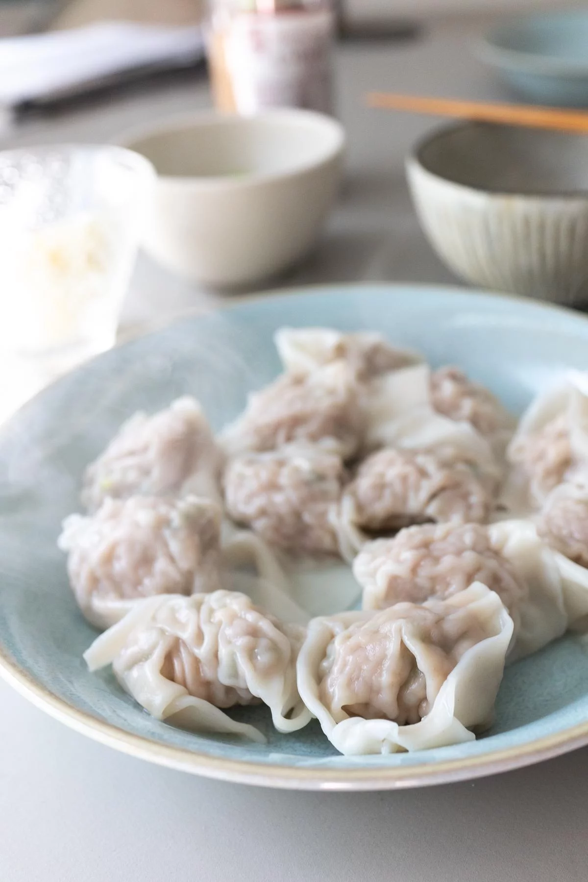A plate of boiled wontons