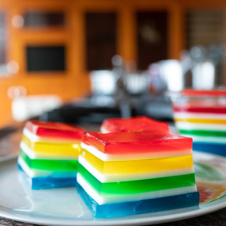 Cubes of Rainbow Jello on a plate