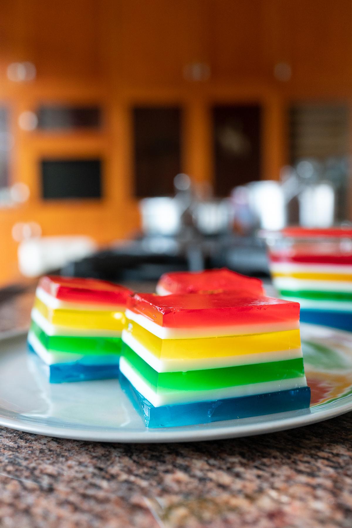 Cubes of Rainbow Jello on a plate