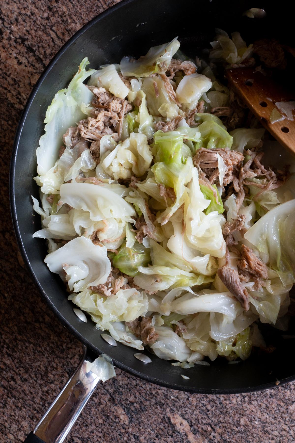 Kalua pork and cabbage in the saucepan, ready to eat