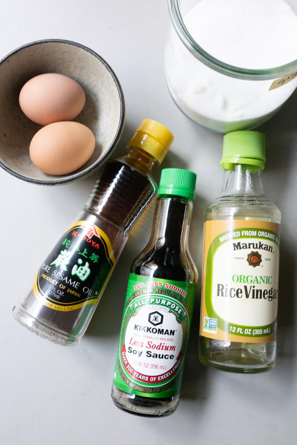 Ingredients for Pocket Eggs: eggs, soy sauce, rice vinegar, sesame oil, and sugar.