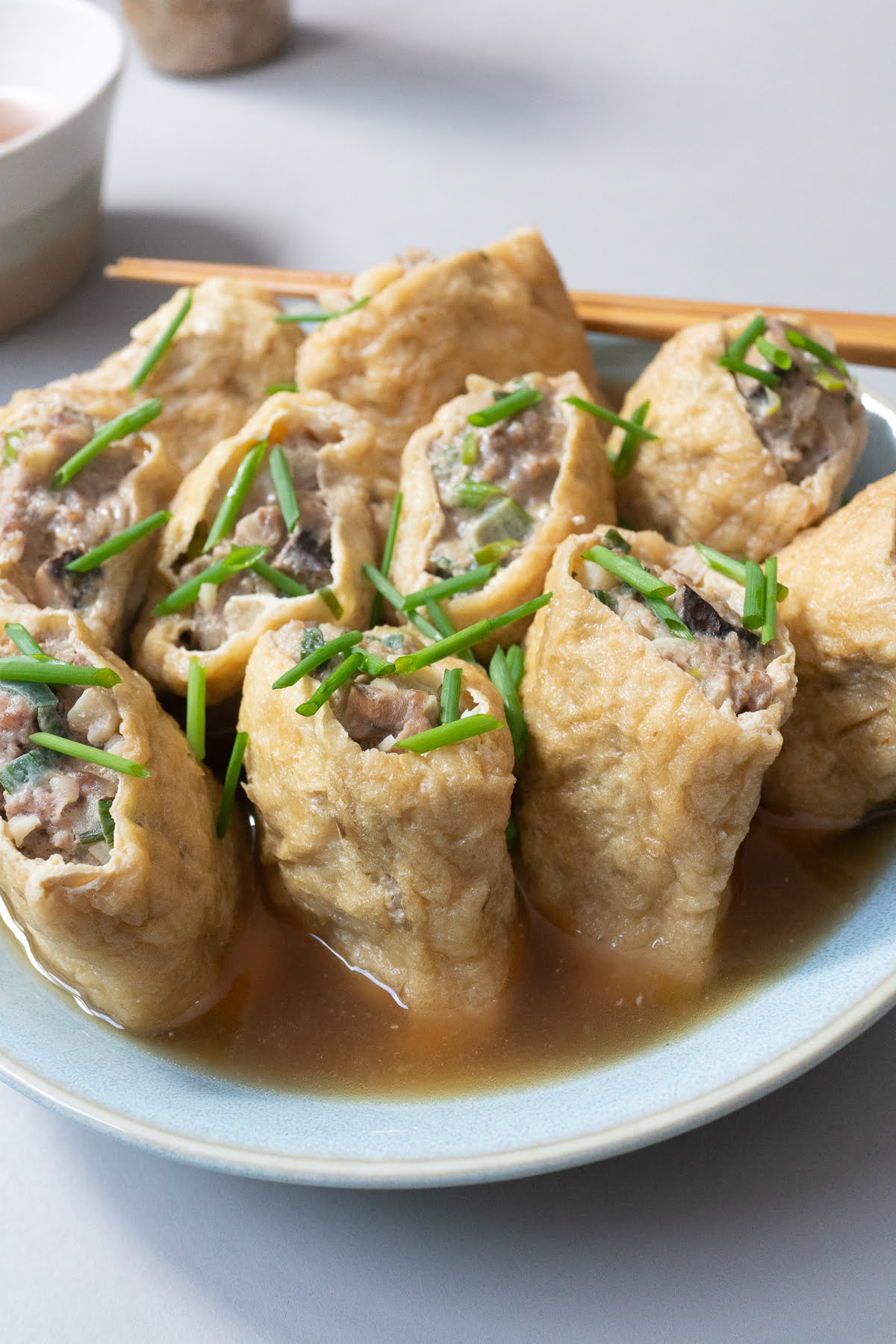 A plate of stuffed aburage, ready to eat.