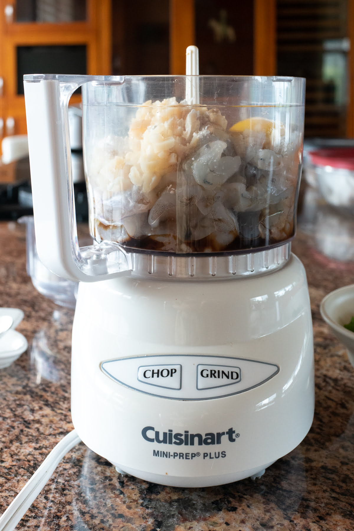 Blending all the Shrimp Toast ingredients in the food processor.