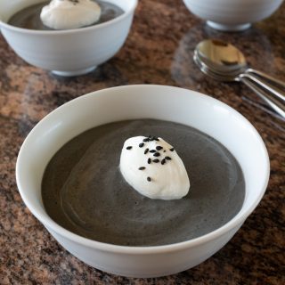 Bowls of black sesame pudding, ready to eat.