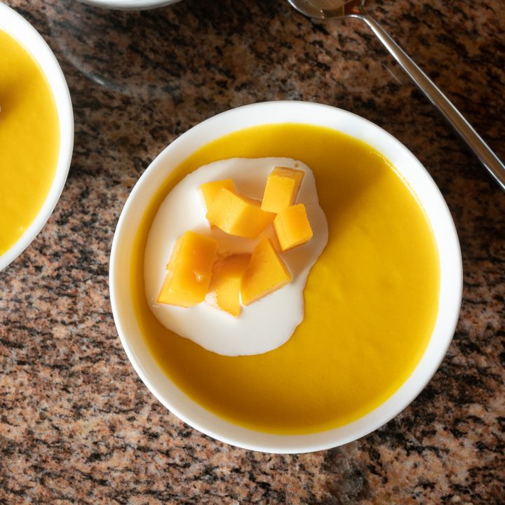 Bowls of mango pudding, ready to eat.