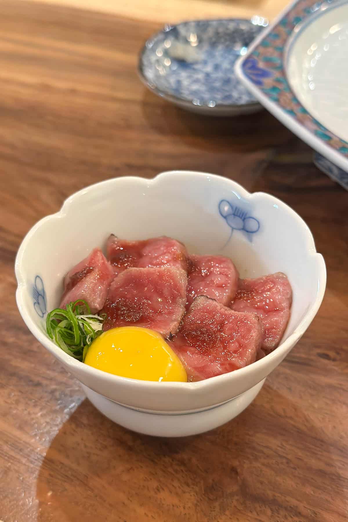 @Sushi wagyu and quail egg on rice.
