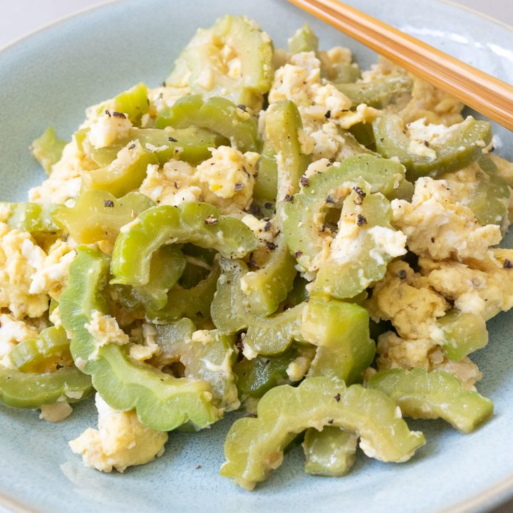 A plate of bitter melon with eggs stir fry.