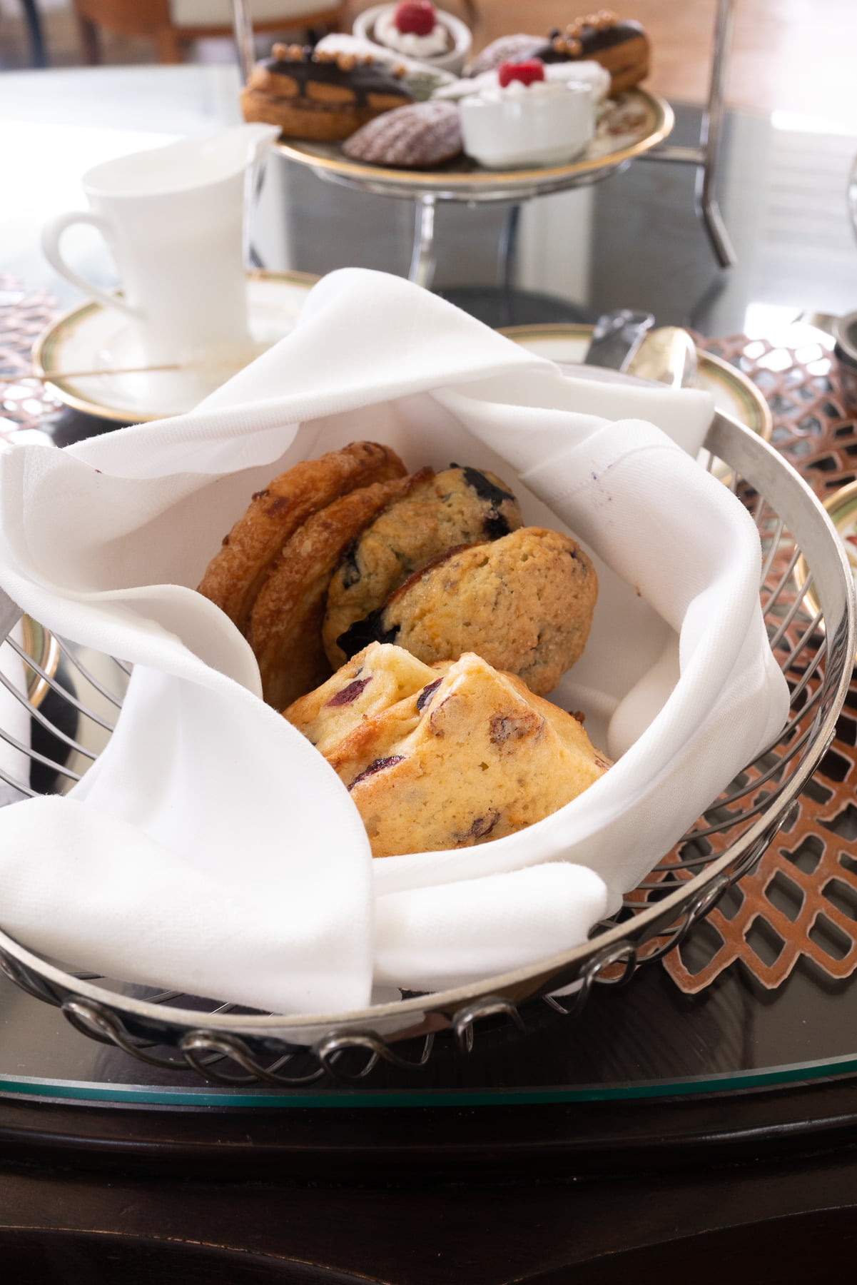 A basket of scones and pastries at Kahala Hotel’s afternoon tea.