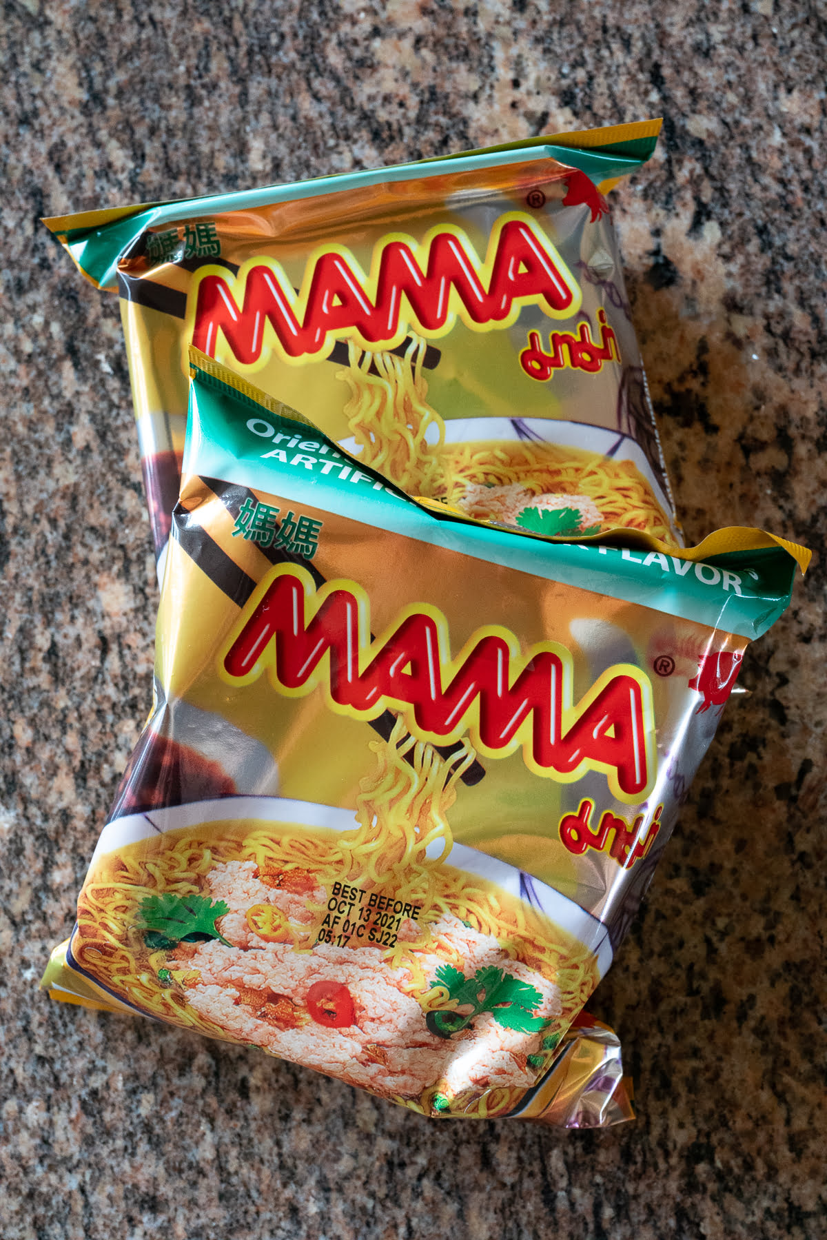 Two packages of Mama noodles.