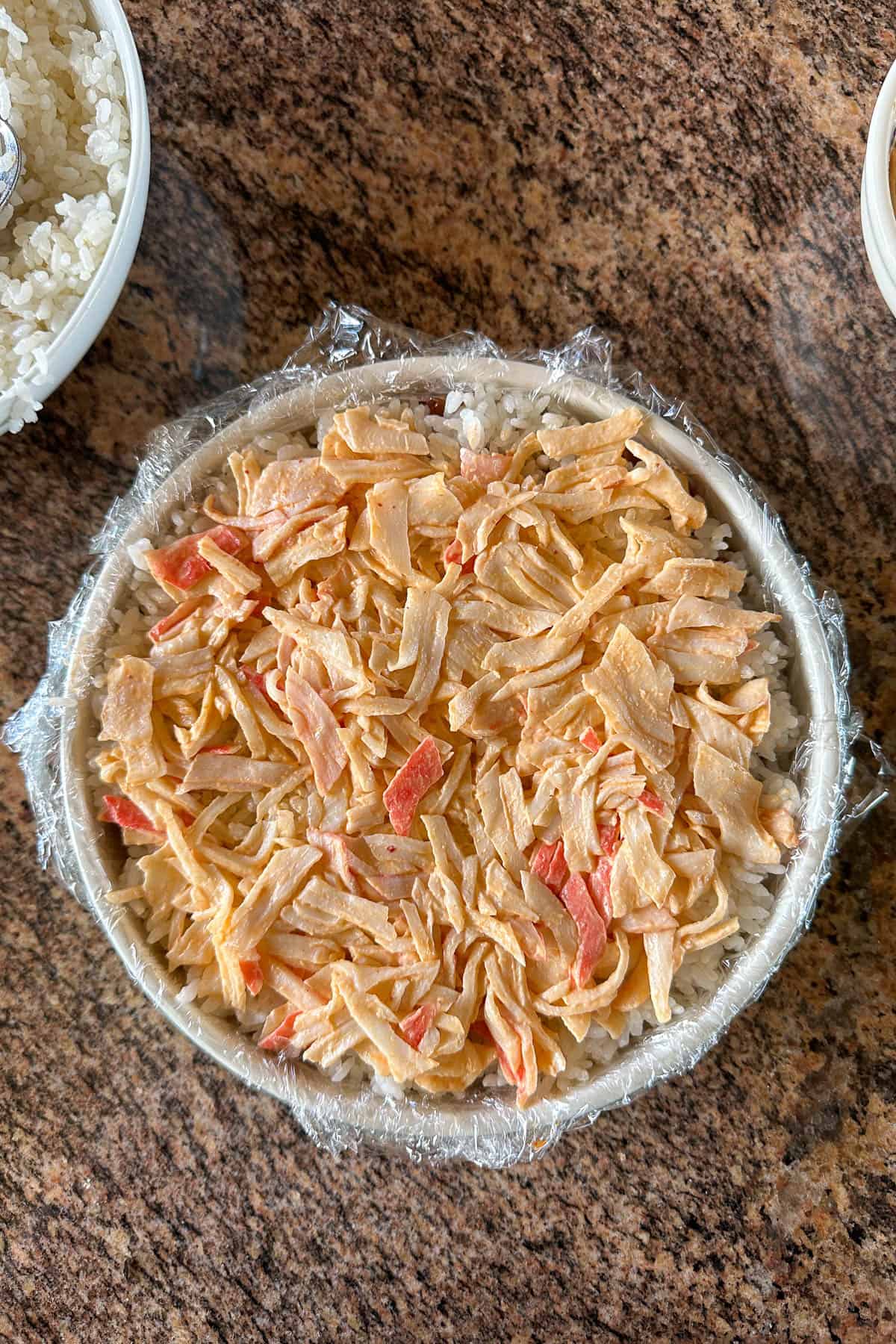 Crab salad layer of the sushi cake.