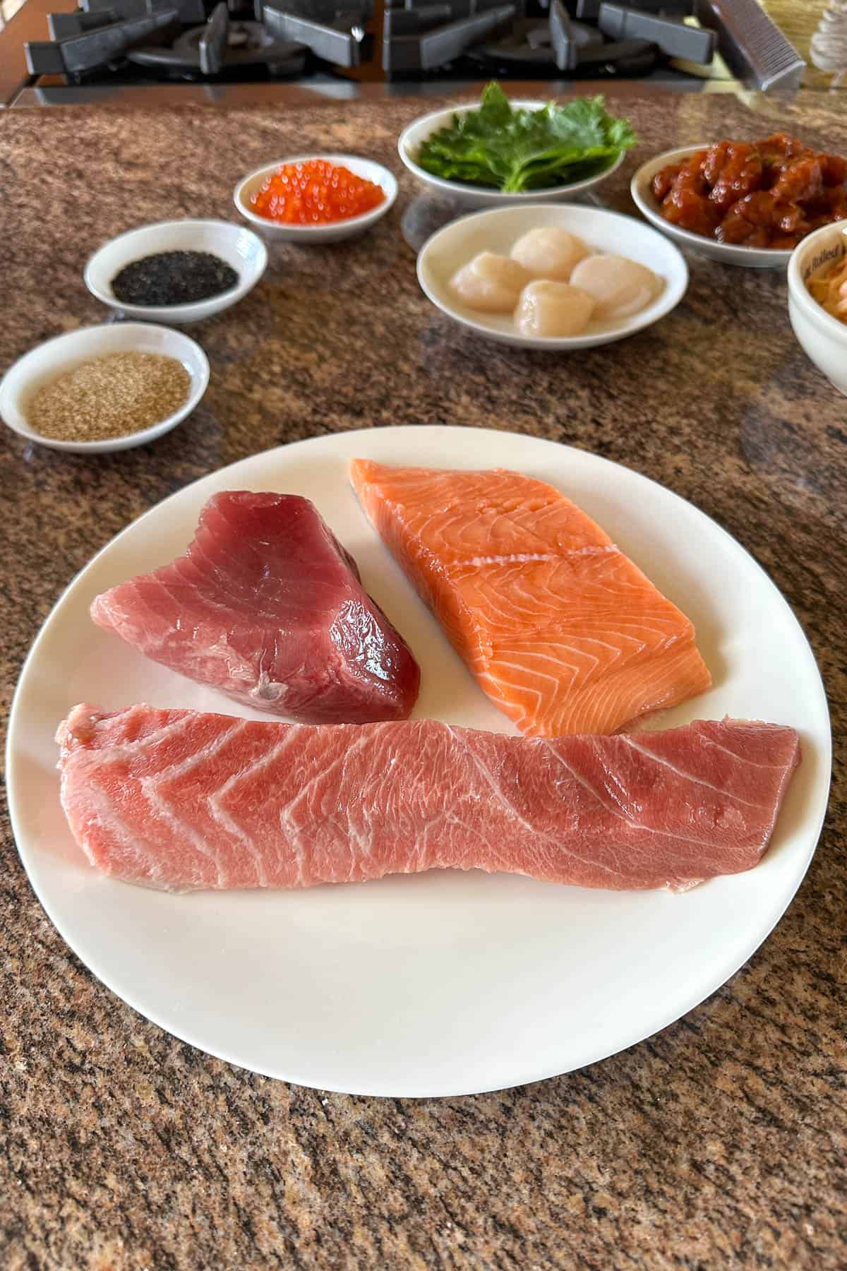 Sashimi options for sushi cake.