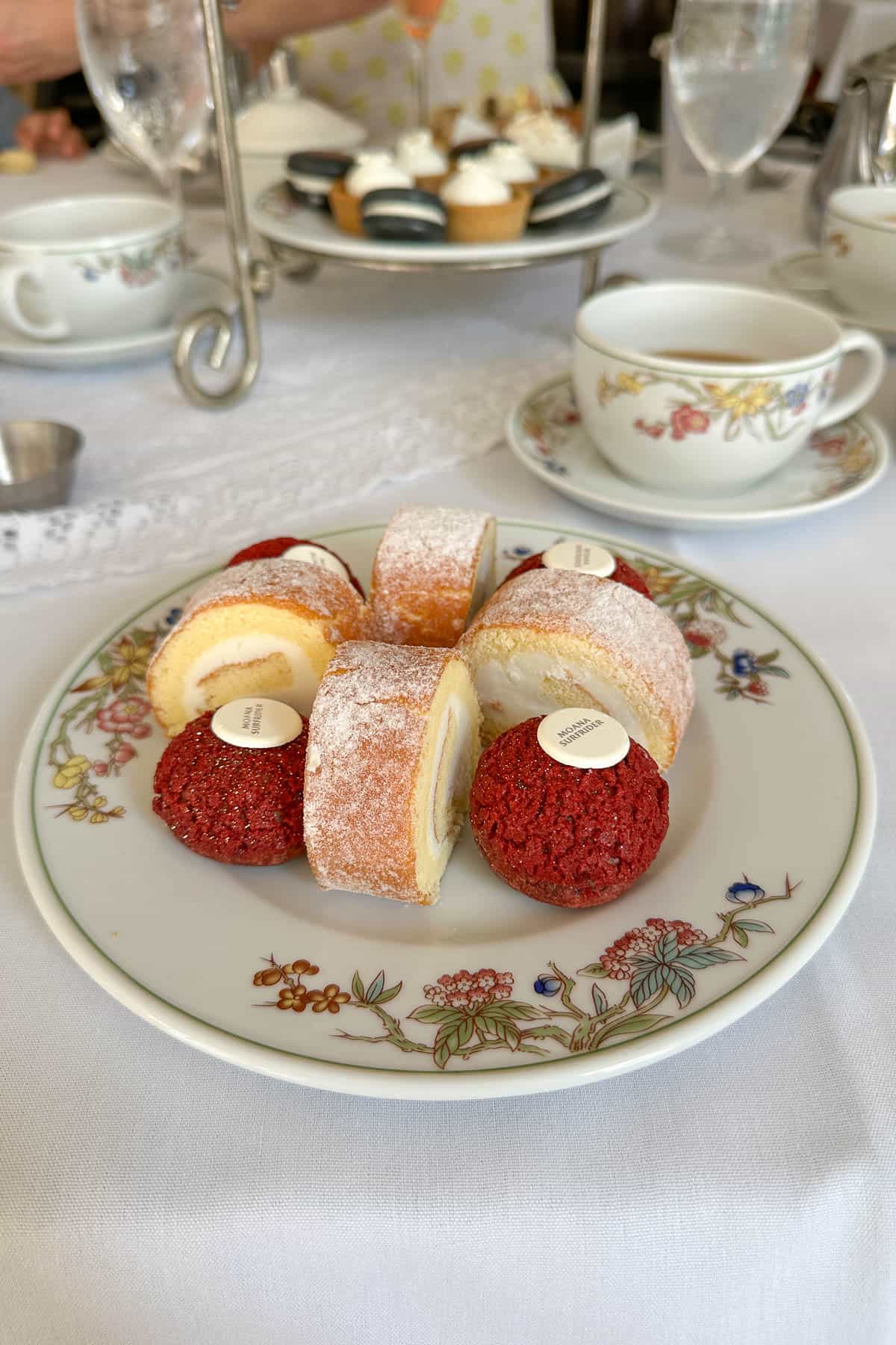 Moana Surfrider 2025 afternoon tea cakes and cream puffs.