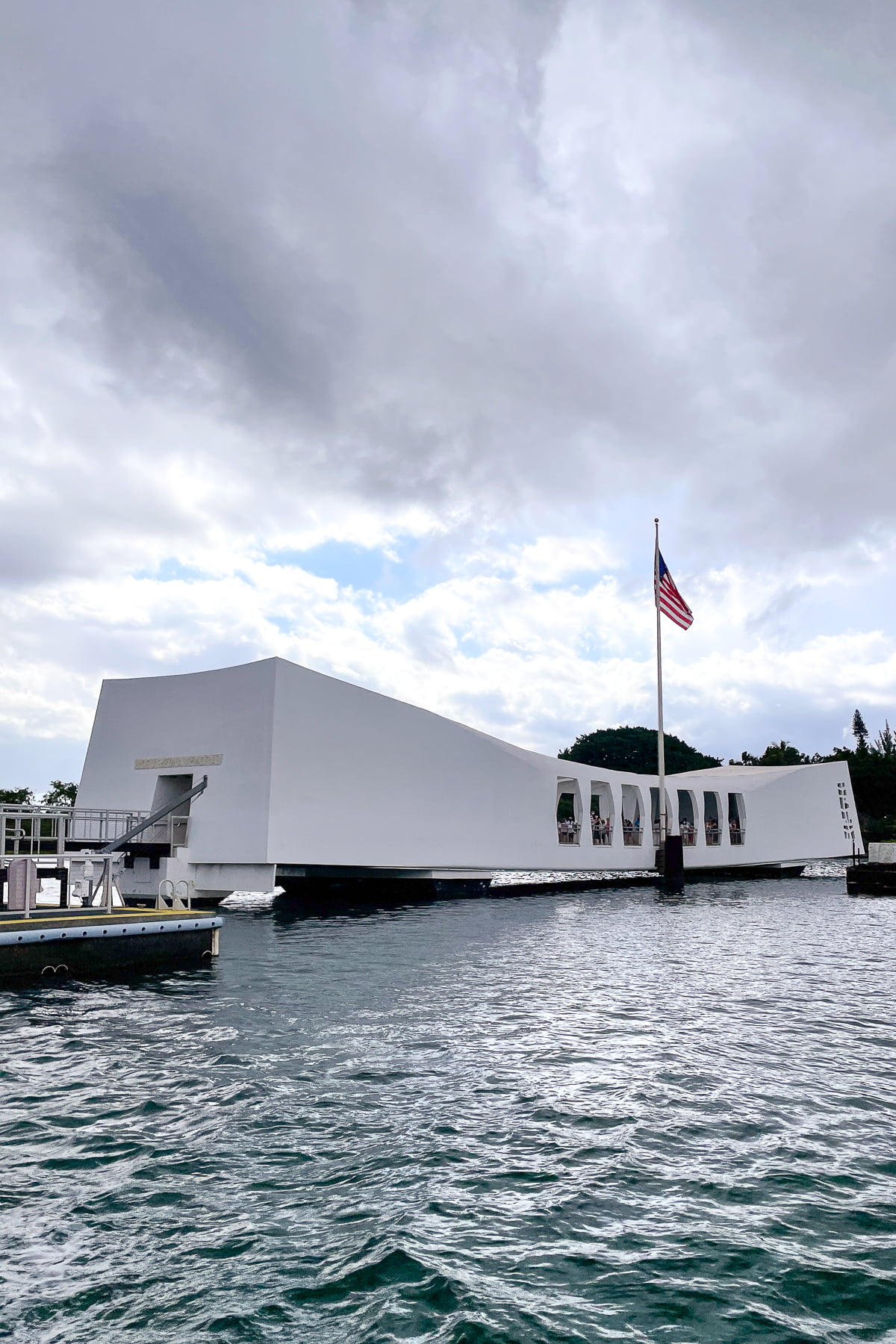 Approaching the USS Arizona Memorial by boat while visiting Pearl Harbor.