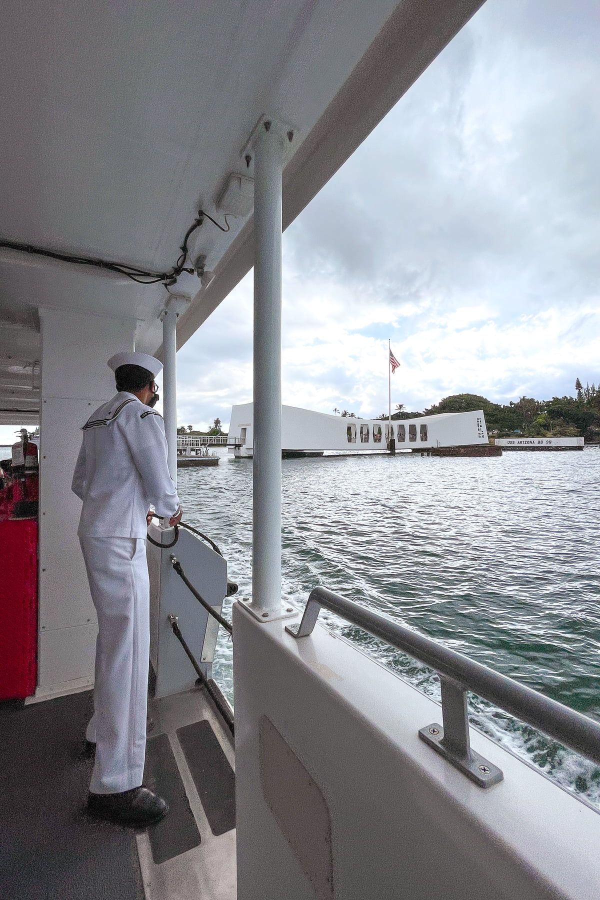 Approaching the USS Arizona Memorial by boat while visiting Pearl Harbor.