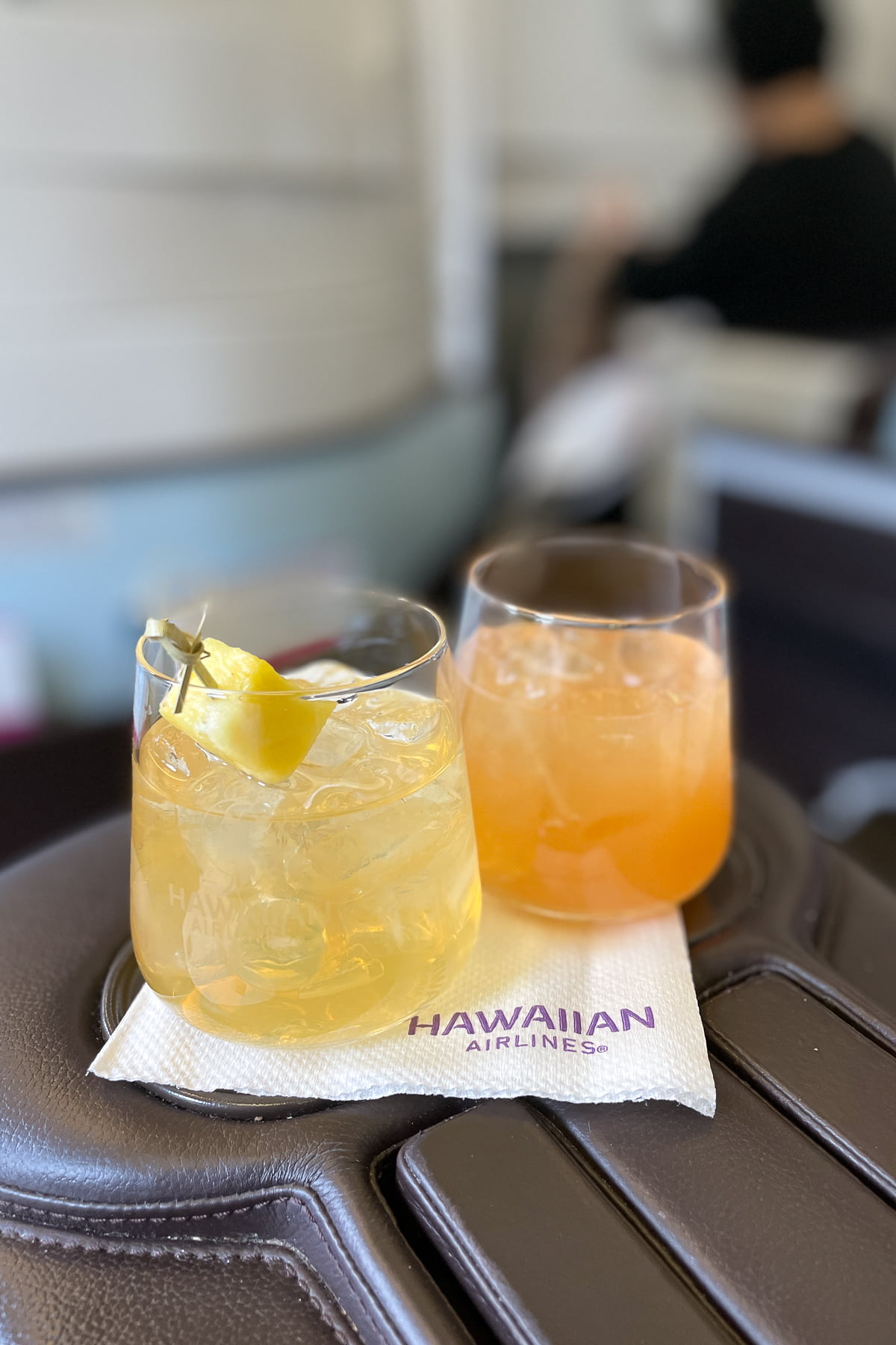 Mai Tai and POG juice on Hawaiian Airlines First Class.