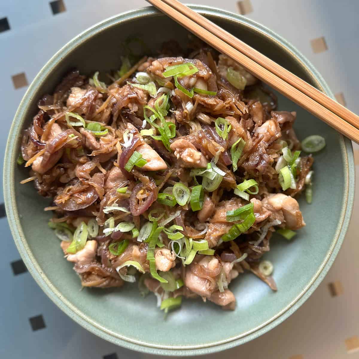 A plate of ginger chicken, ready to eat.