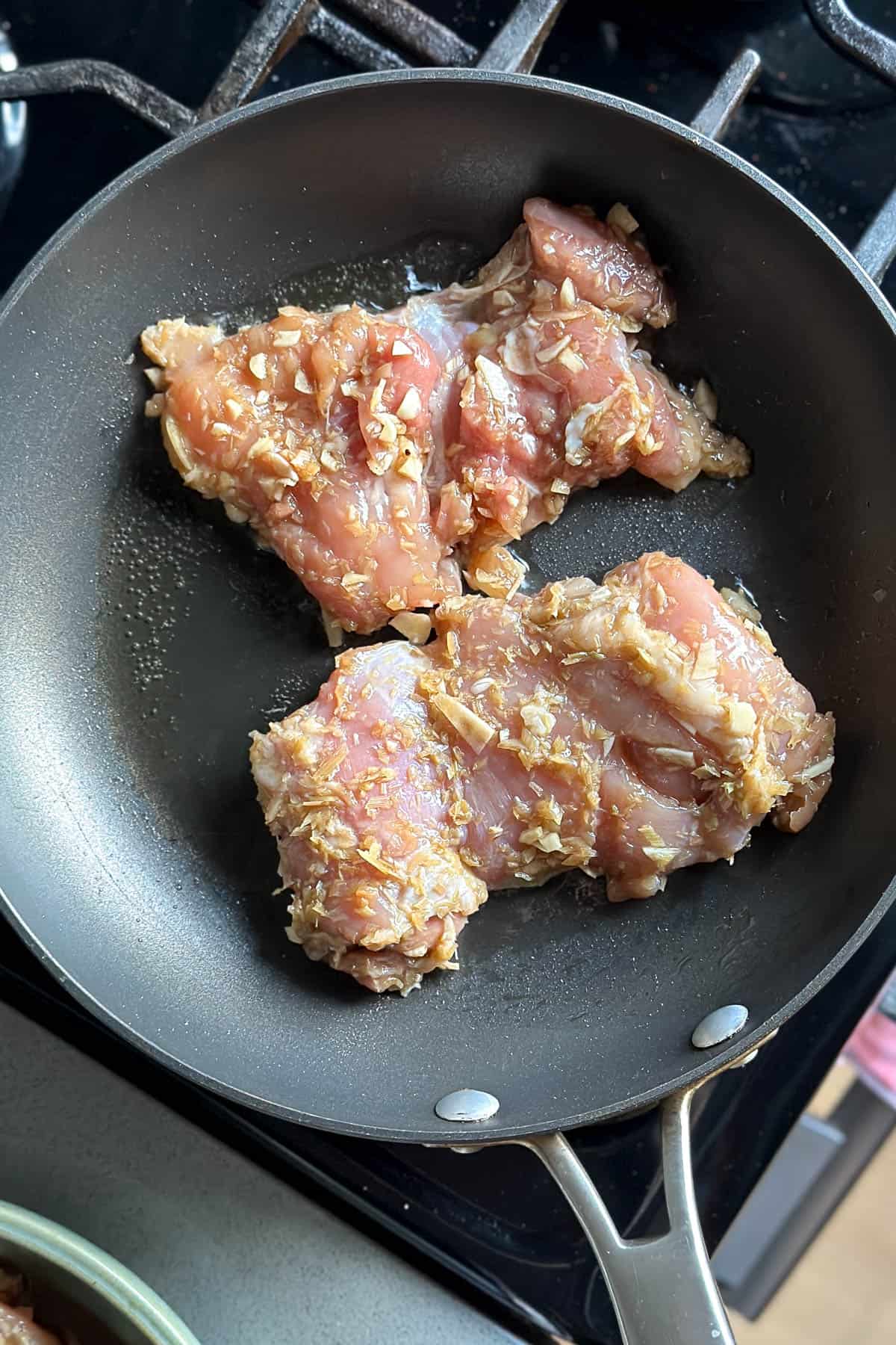 Pan frying lemongrass chicken.