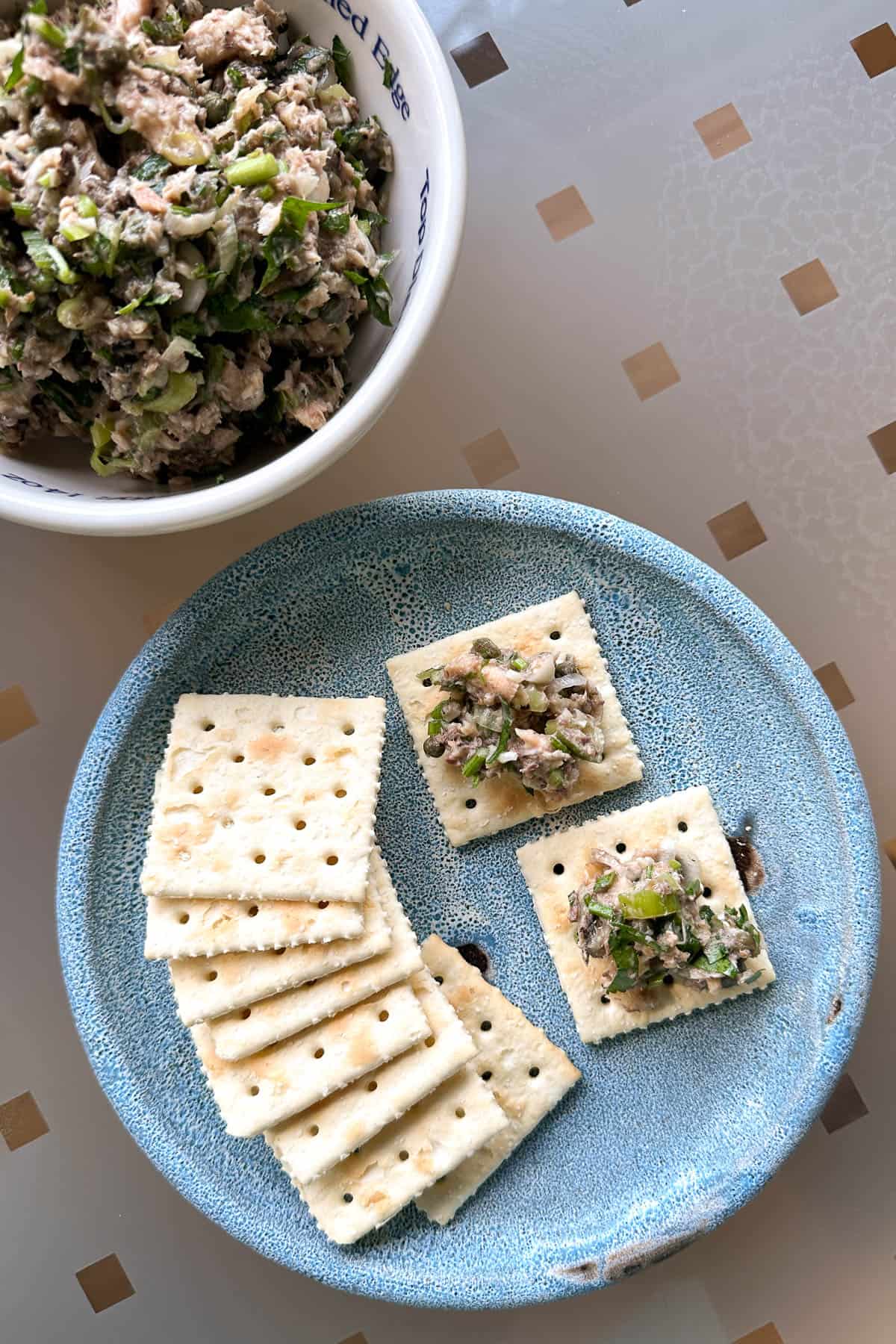 Sardine salad on crackers.