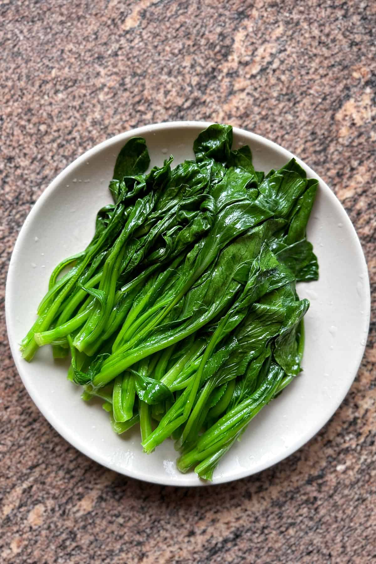 A plate of just blanched choy sum.