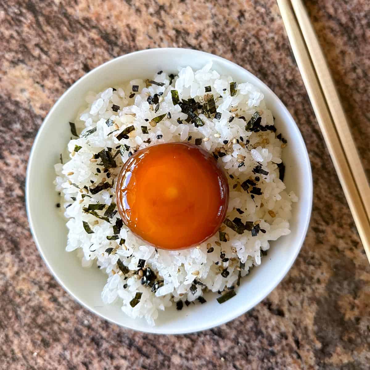 Soy Cured Egg Yolk on a bowl of rice.