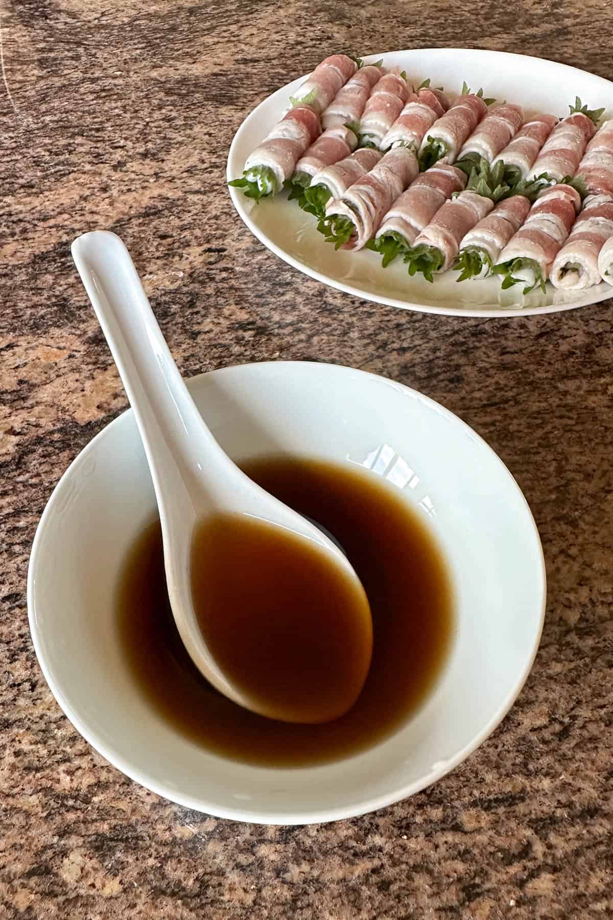A sauce made of soy sauce, mirin, and sake, in a bowl.