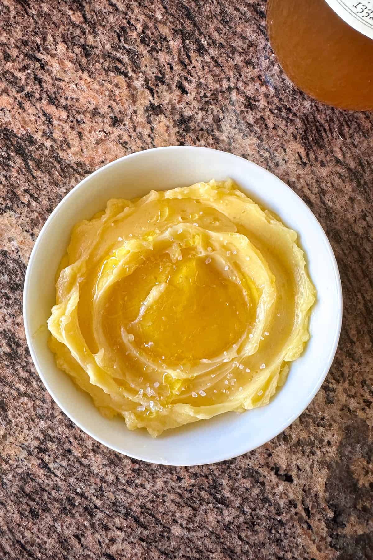A bowl of honey butter.