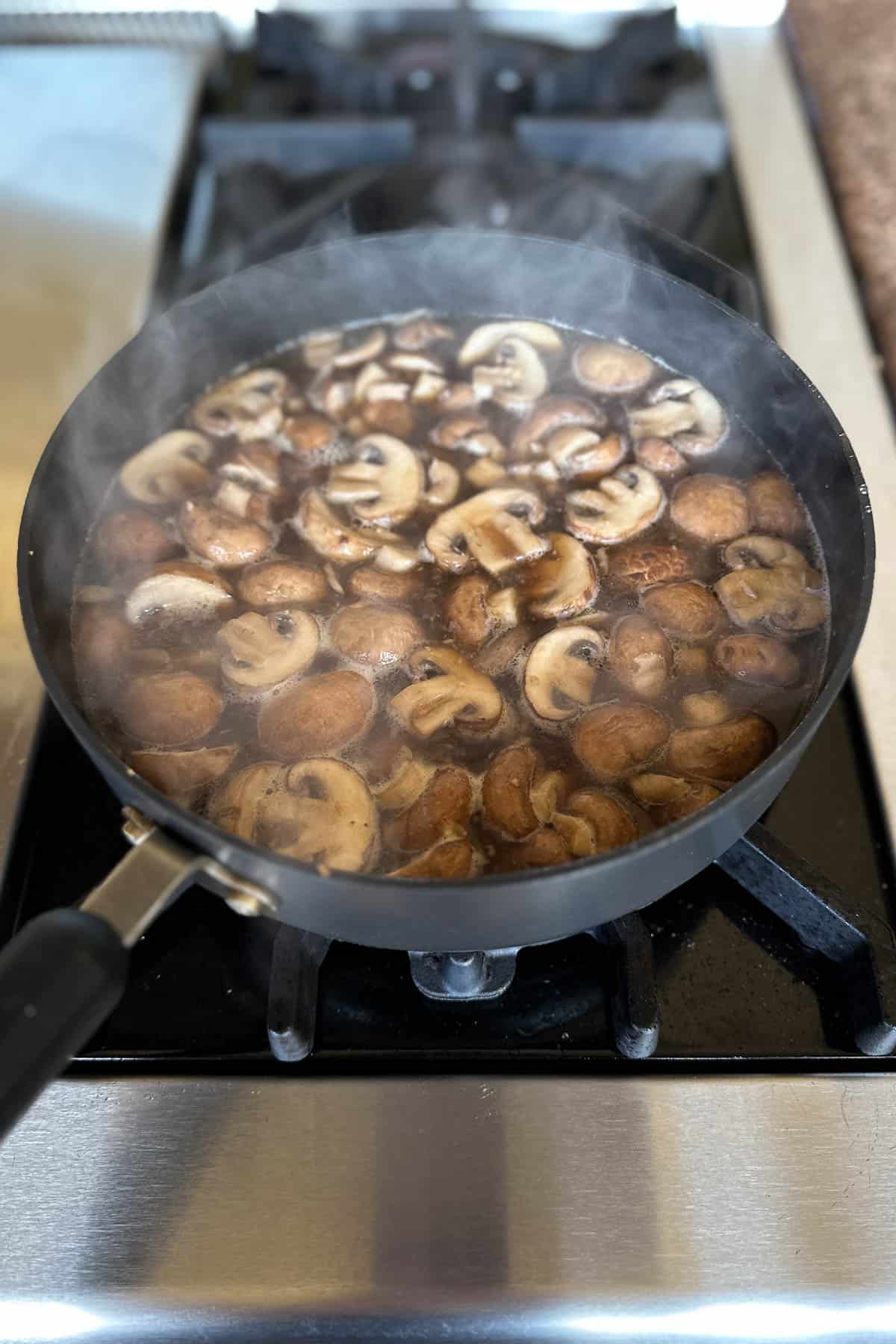 Making braised mushrooms.