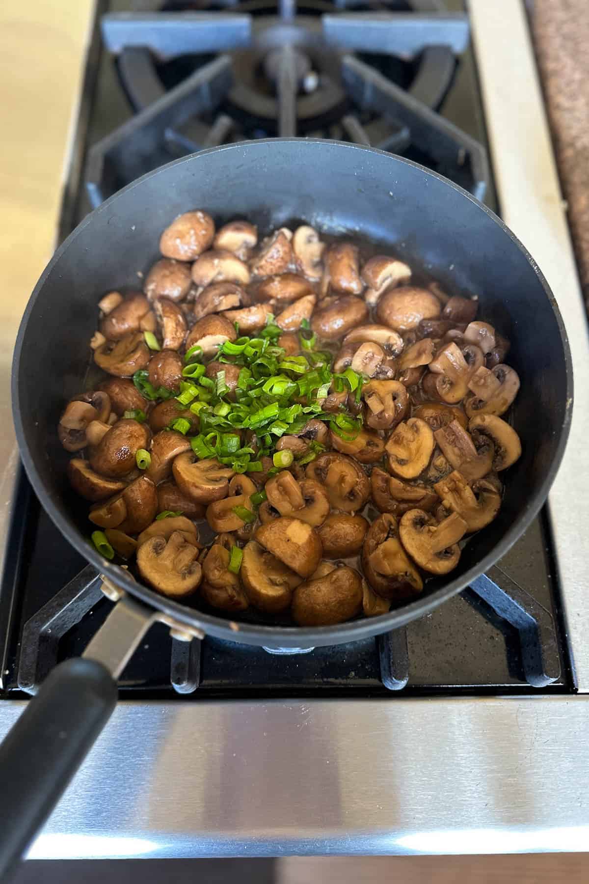 Making braised mushrooms.