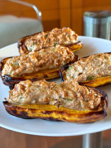 A plate of Stuffed Delicata Squash with Fish Paste.