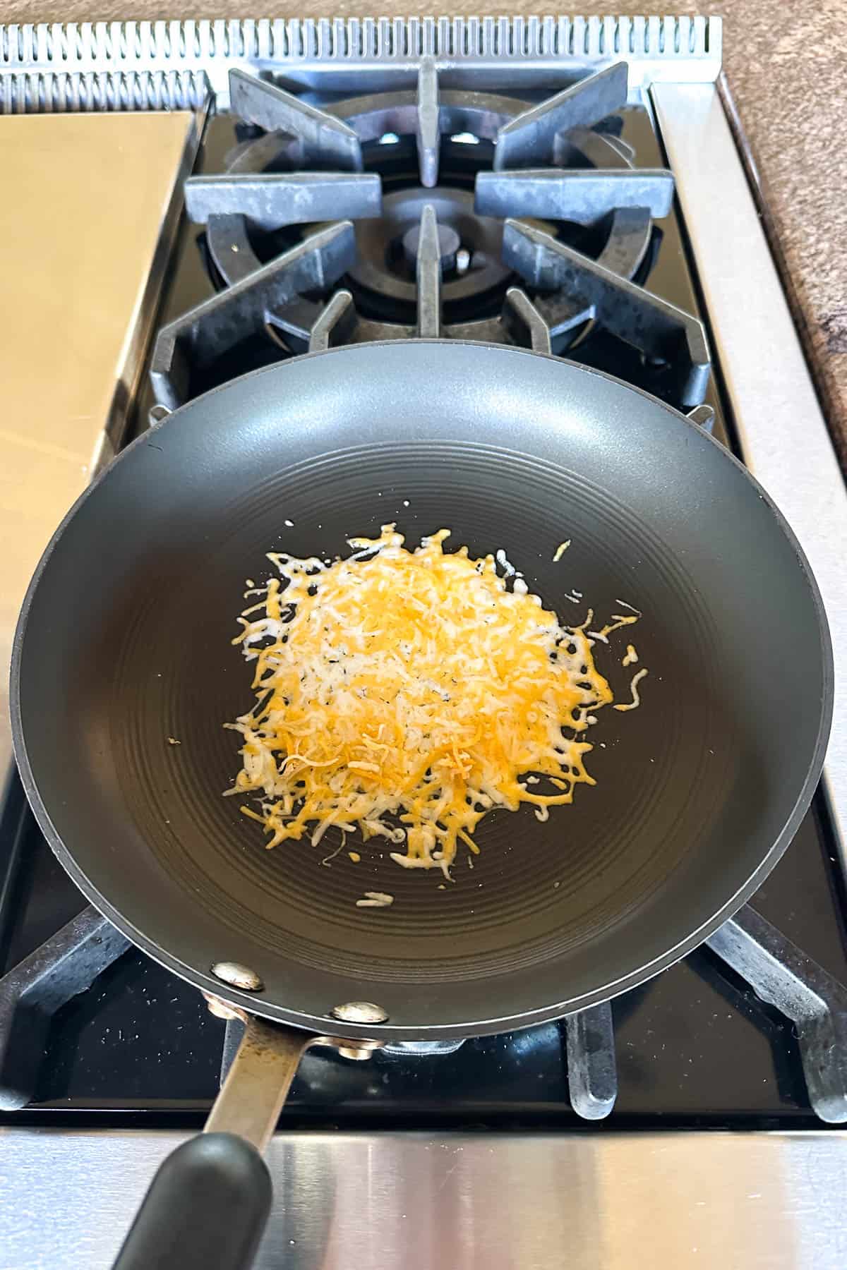 Making crispy cheese tacos.