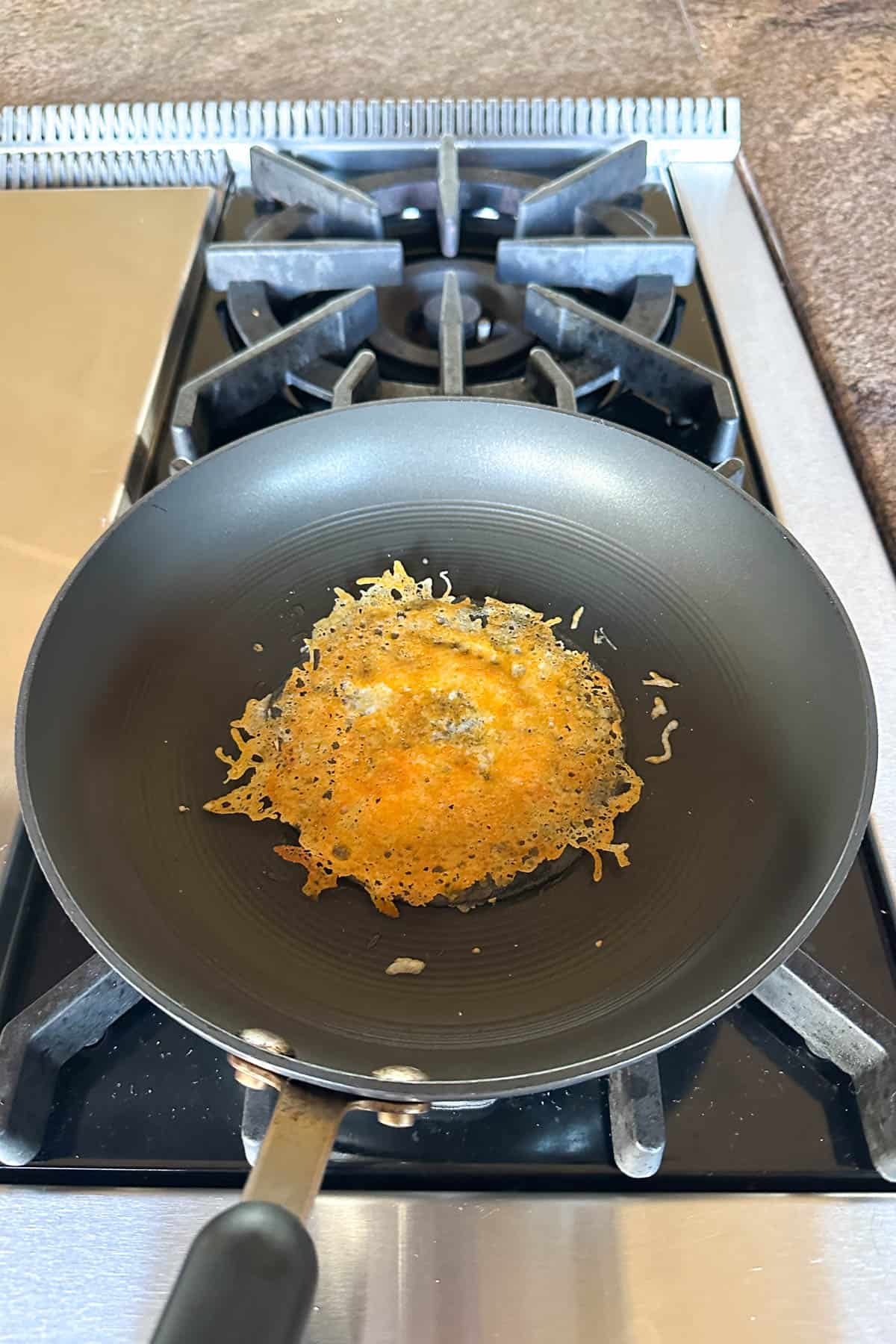 Making crispy cheese tacos.