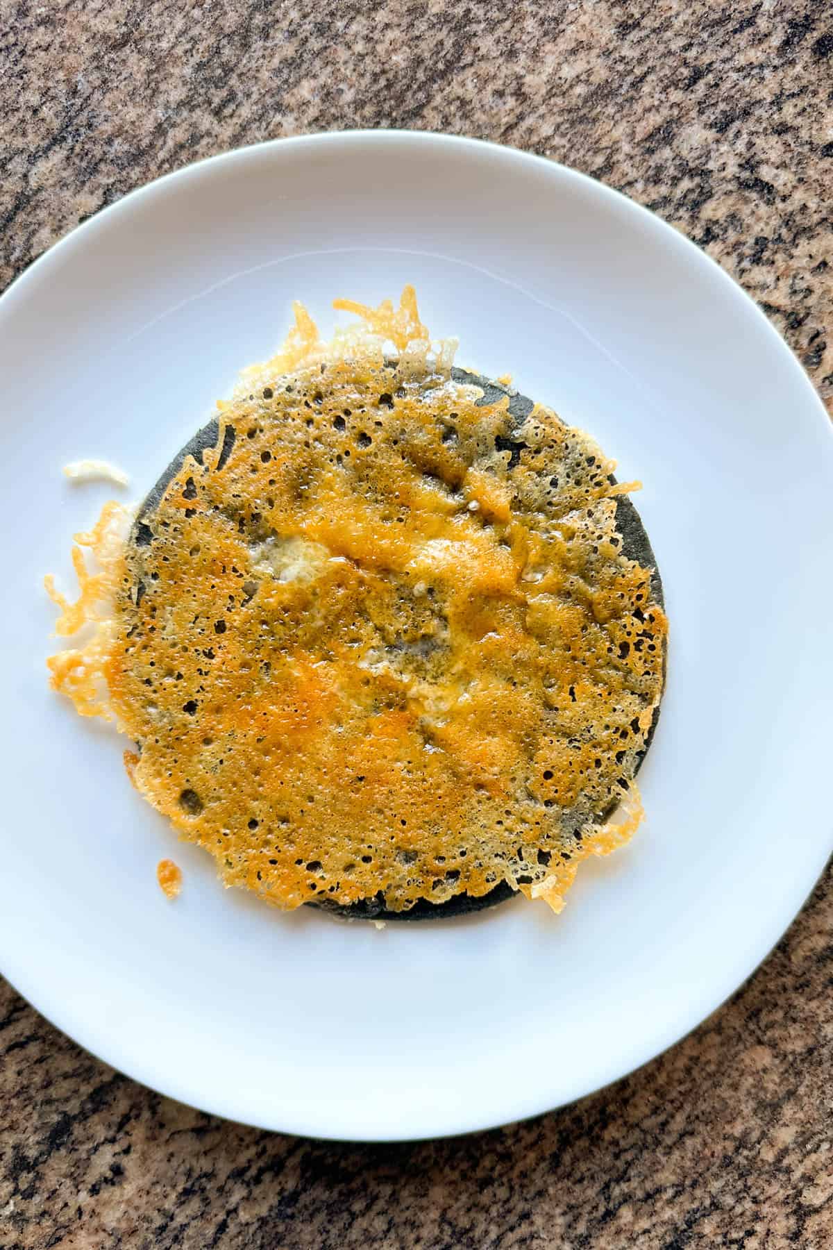 Making crispy cheese tacos.