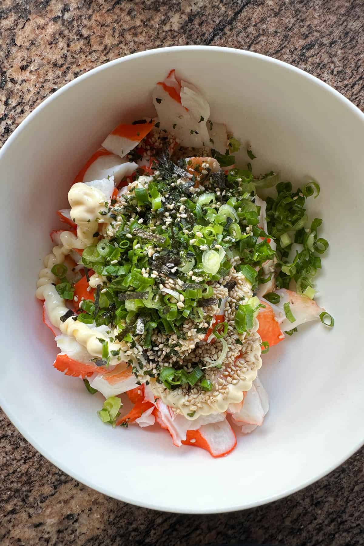 Making imitation crab salad.