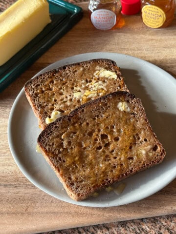 Honey butter toast on rye bread.