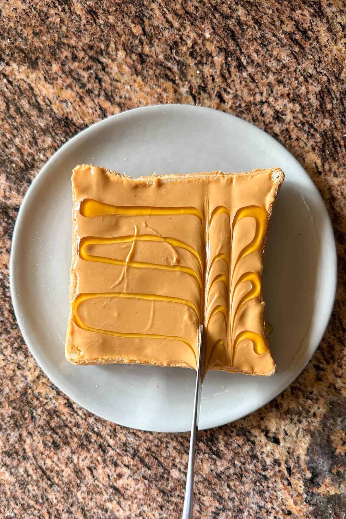 Adding honey for Peanut Butter and Honey Toast.