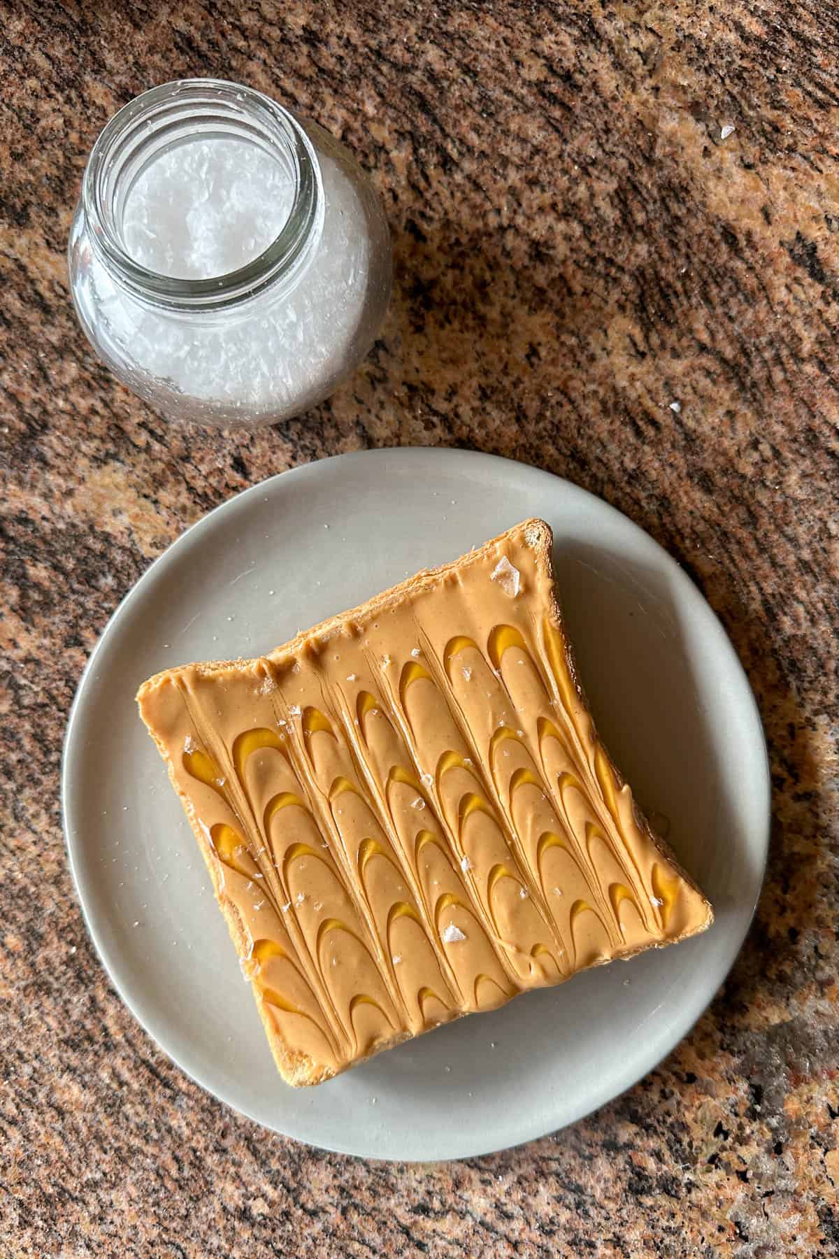 Making Peanut Butter and Honey Toast.