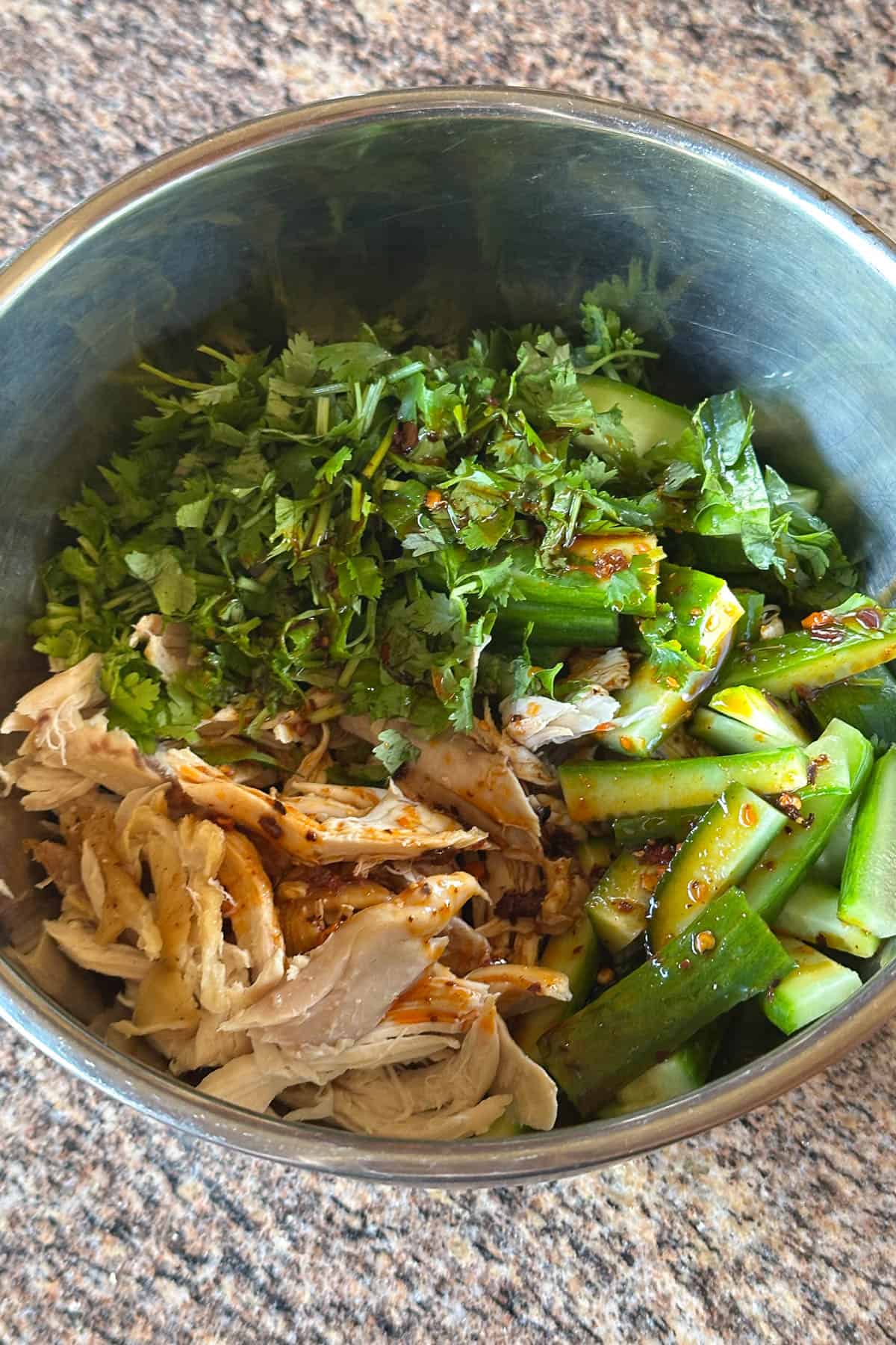 Making Shredded Chicken and Cucumbers.