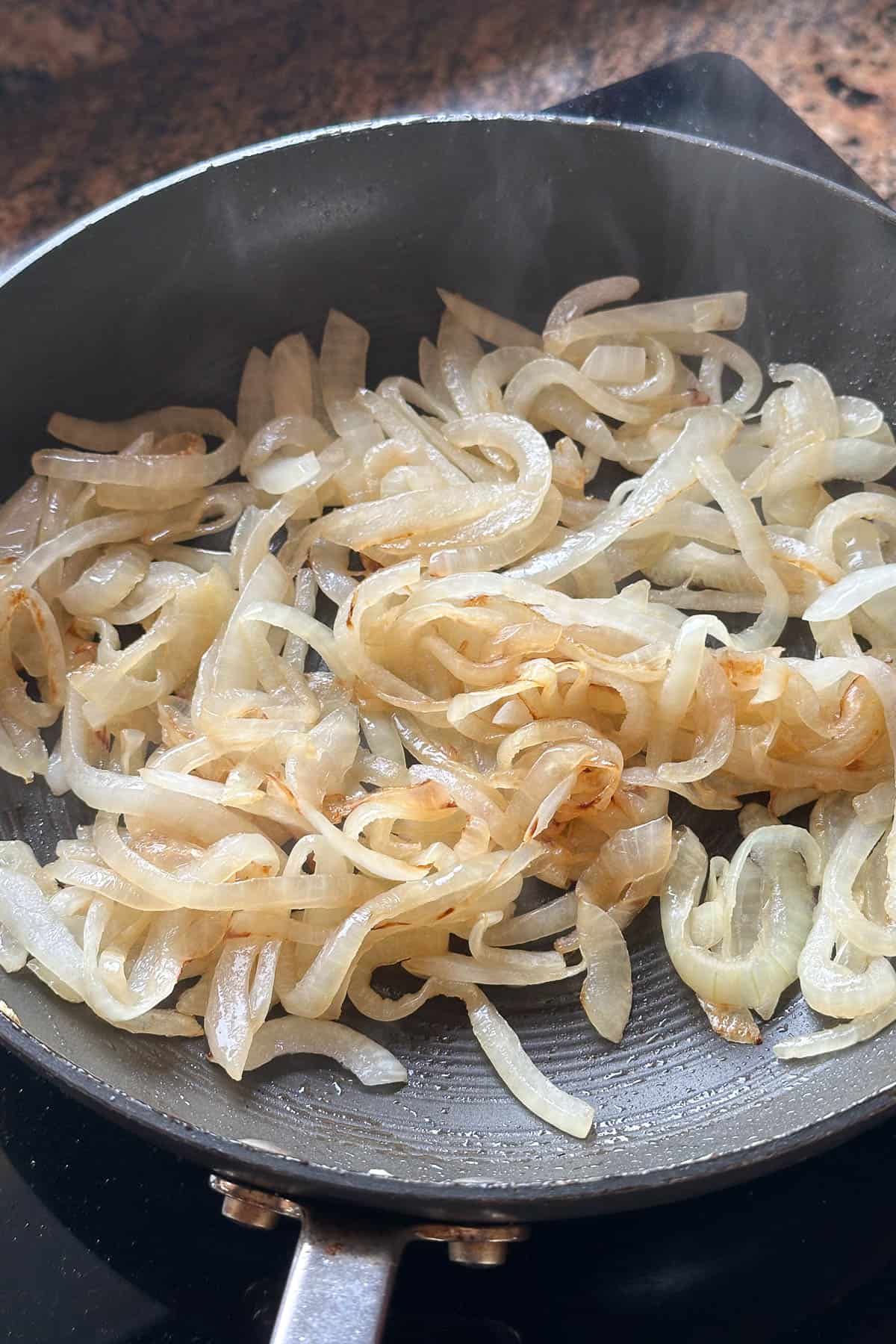 Making Tuna and Onion Stir-Fry.