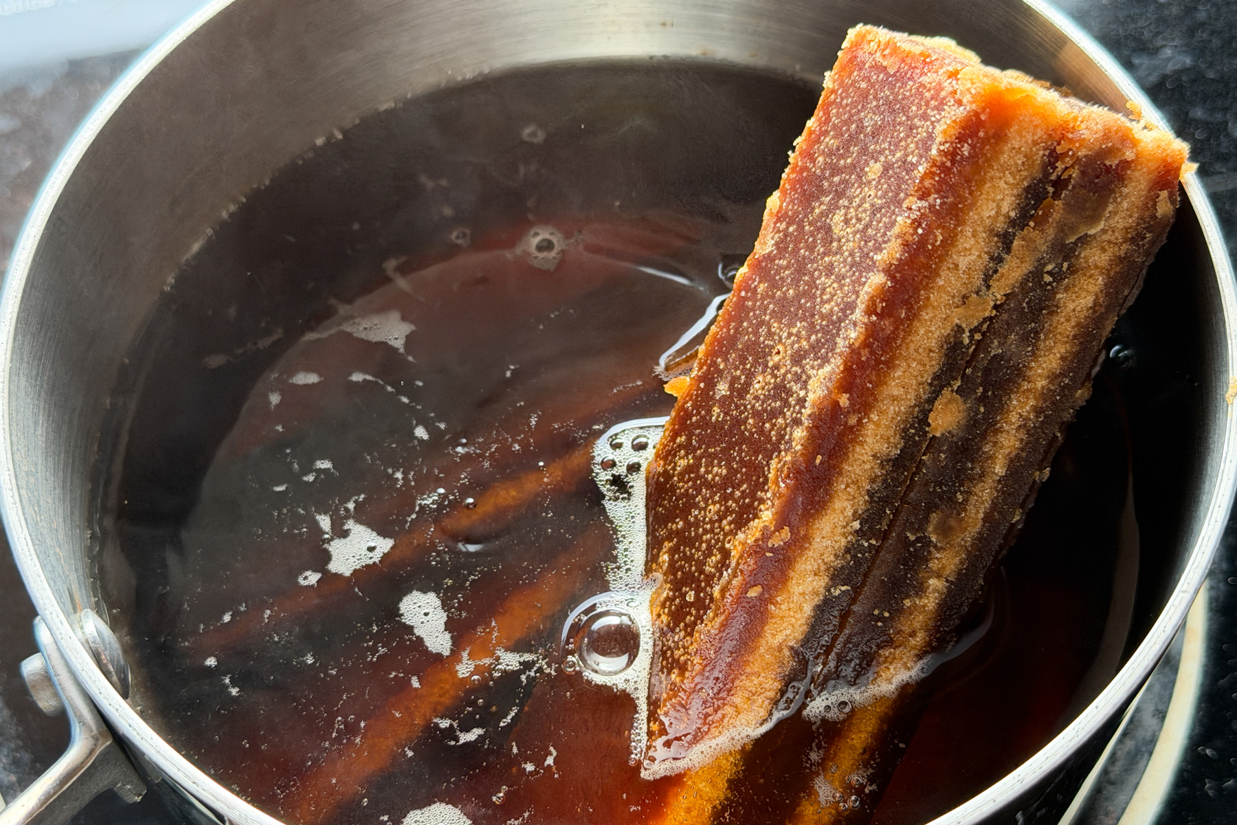 Melting Chinese brown brick sugar / slab sugar to make Nian Gao (Gau).
